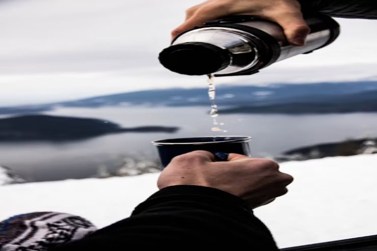 liquid poured out of a hydro flask into a cup